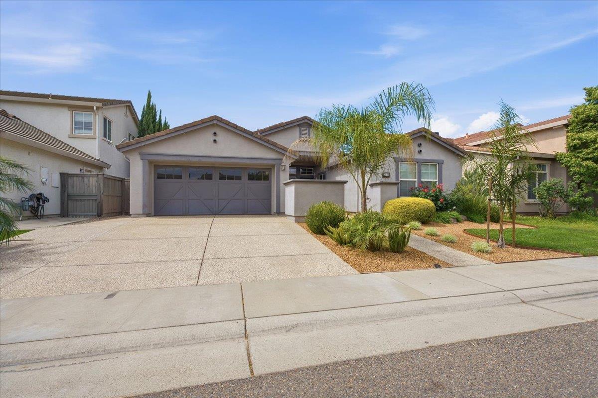 7821 Shell Beach Drive Antelope, CA 95843 - Photo 2 of 40 a front view of a house with porch