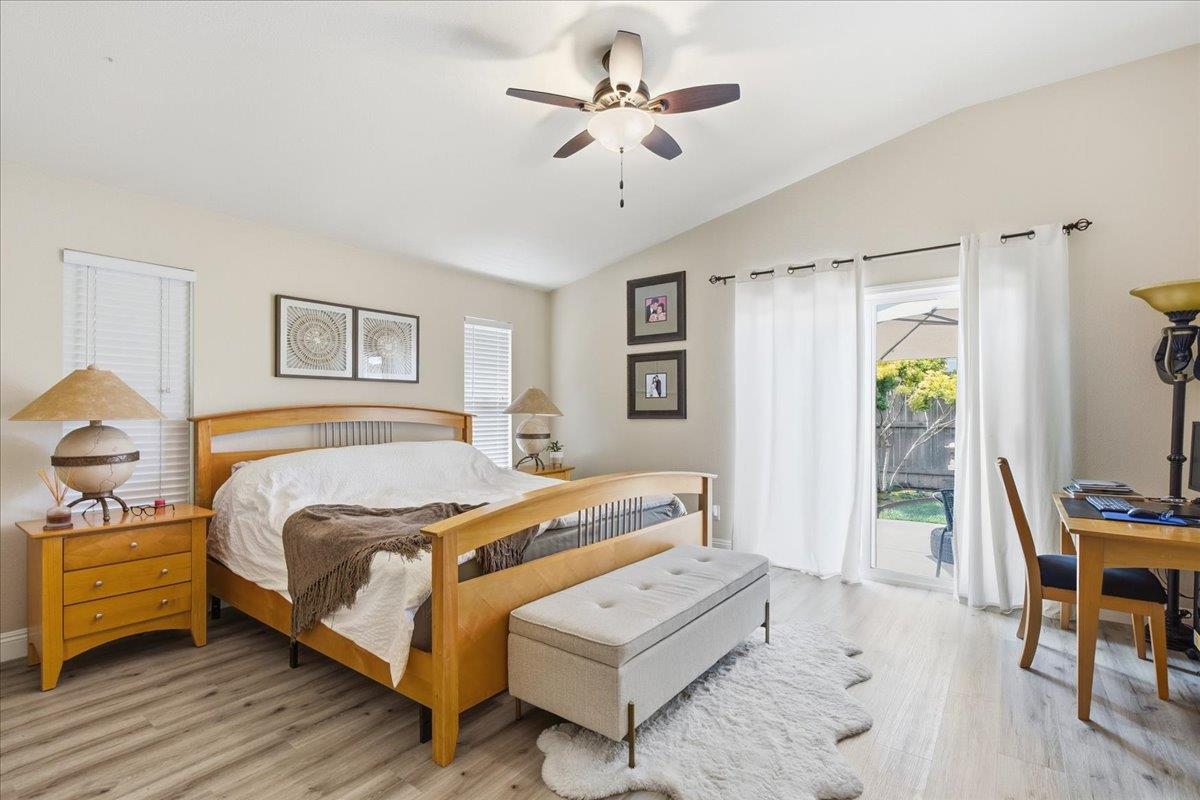 7821 Shell Beach Drive Antelope, CA 95843 - Photo 21 of 40 a bedroom with a bed a table and chair