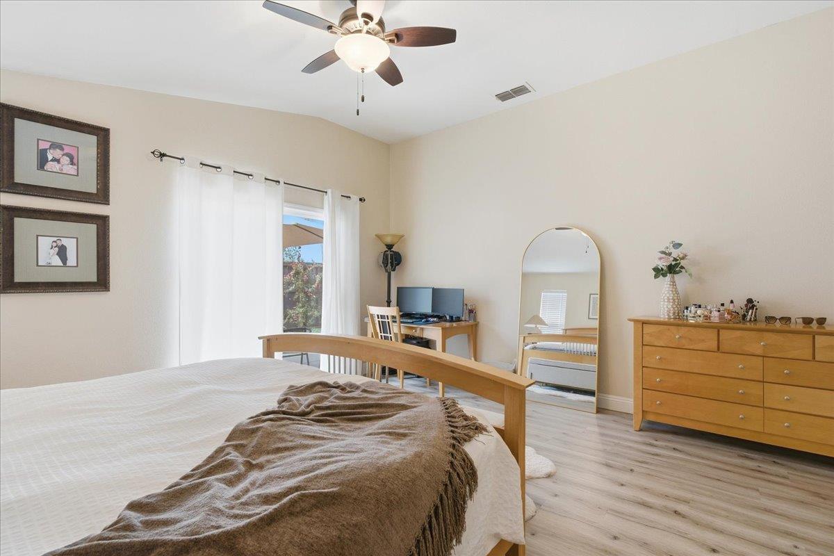 7821 Shell Beach Drive Antelope, CA 95843 - Photo 22 of 40 a bedroom with bed and window