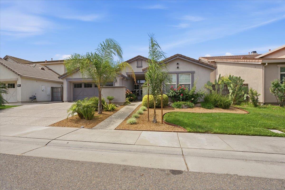 7821 Shell Beach Drive Antelope, CA 95843 - Photo 3 of 40 a front view of a house with a yard
