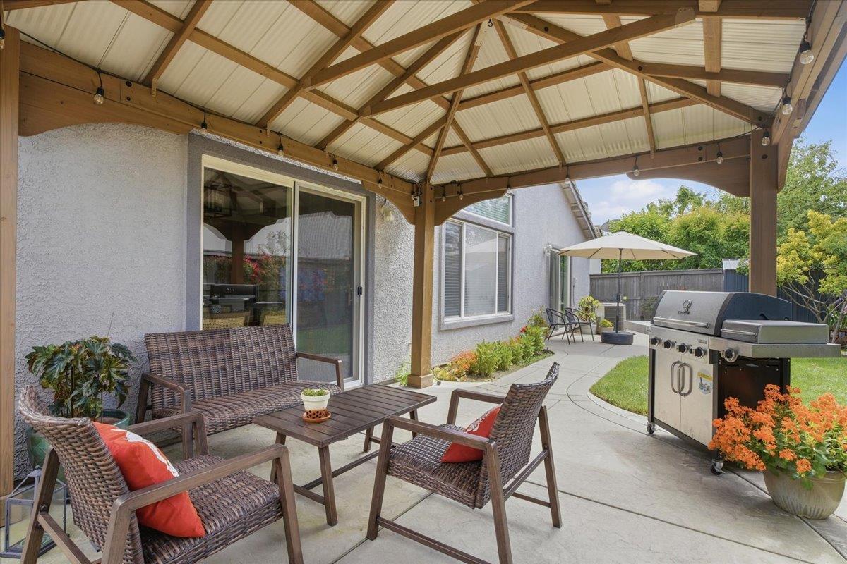7821 Shell Beach Drive Antelope, CA 95843 - Photo 34 of 40 a patio with patio outdoor seating and yard