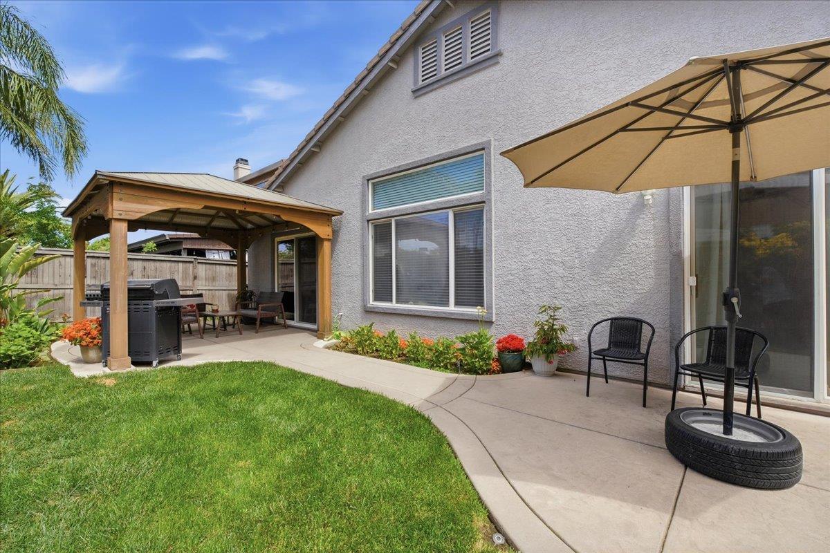 7821 Shell Beach Drive Antelope, CA 95843 - Photo 38 of 40 a house view with a sitting space and garden