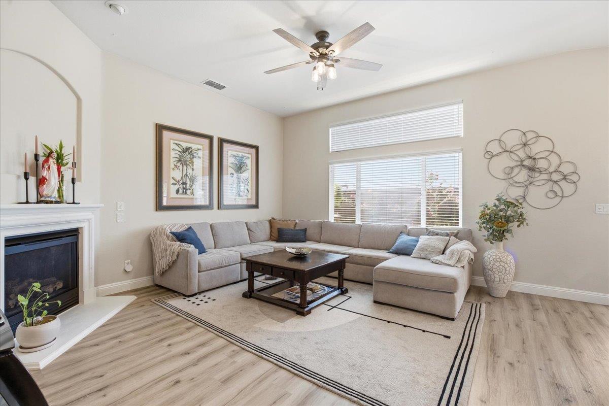 7821 Shell Beach Drive Antelope, CA 95843 - Photo 8 of 40 a living room with furniture and a fireplace
