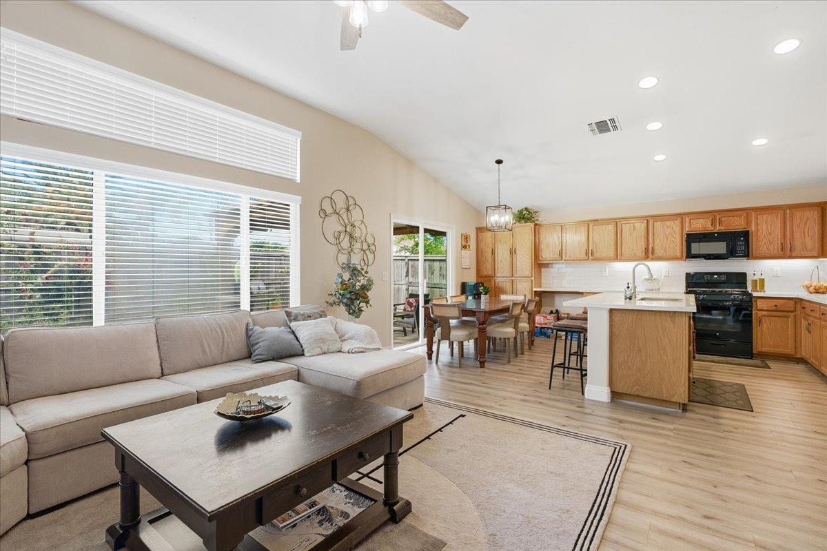 7821 Shell Beach Drive Antelope, CA 95843 - Photo 10 of 40 a living room with furniture and a large window