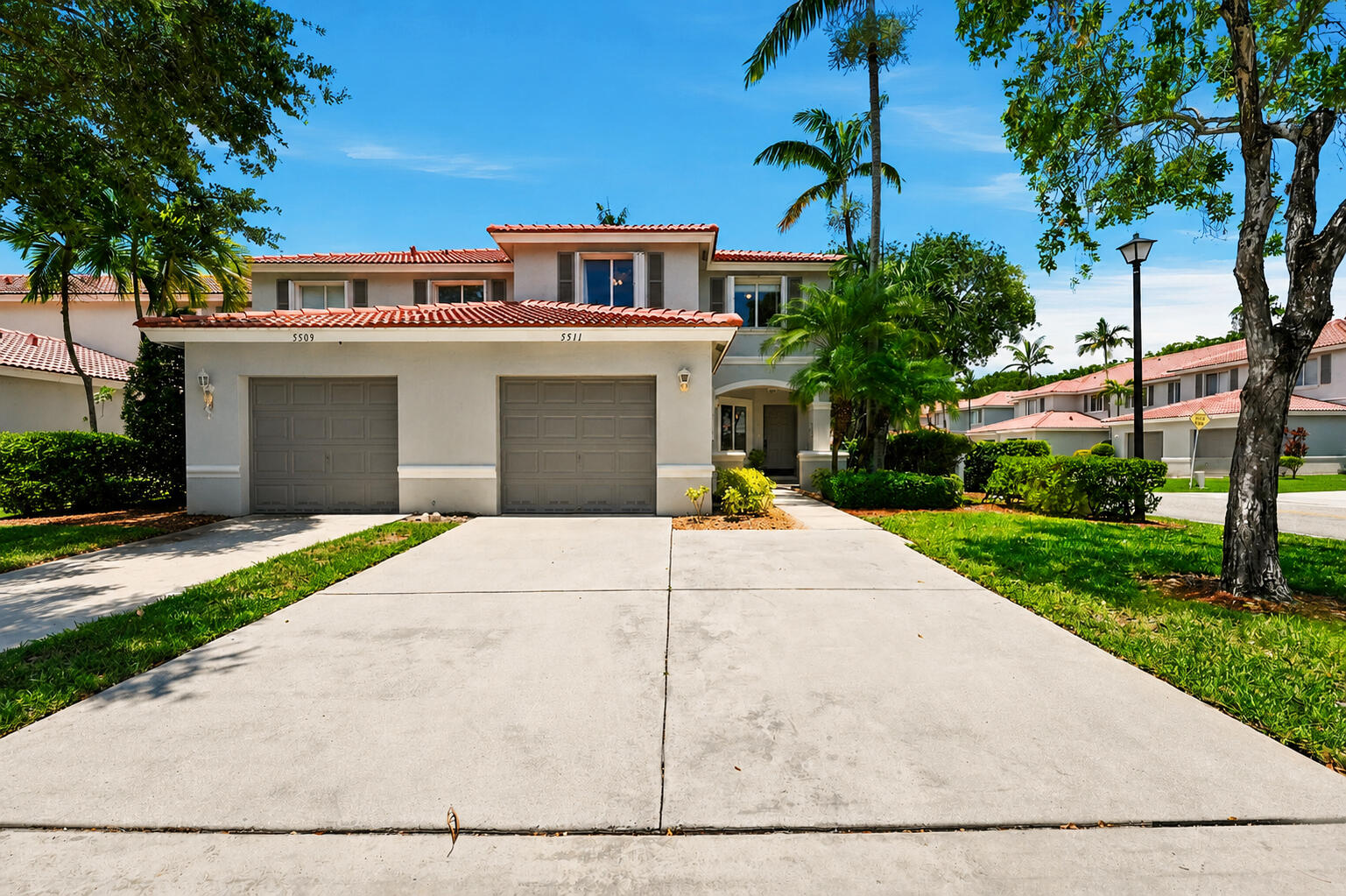 5511 Crossing Rocks Court Riviera Beach, FL 33407 - Photo 2 of 49 02 Front longer
