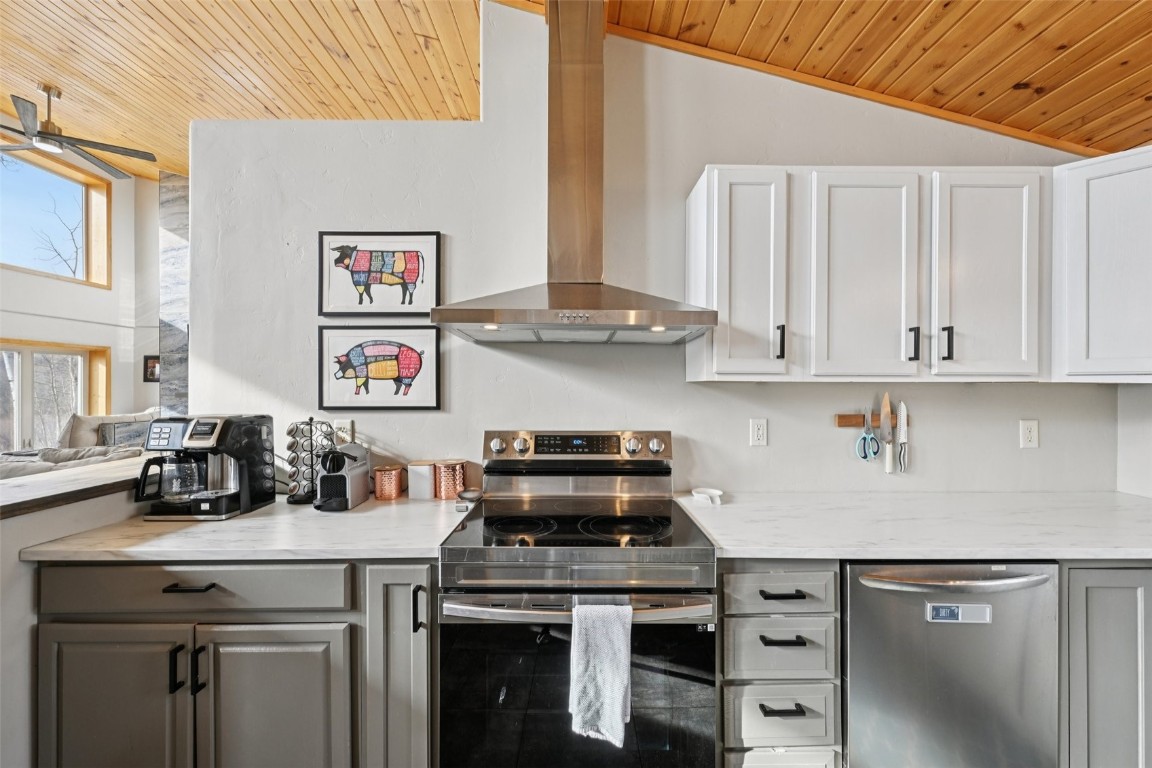 1499 Sheep Ridge Road Fairplay, CO 80440 - Photo 16 of 40 a kitchen with stainless steel appliances a stove a sink and cabinets