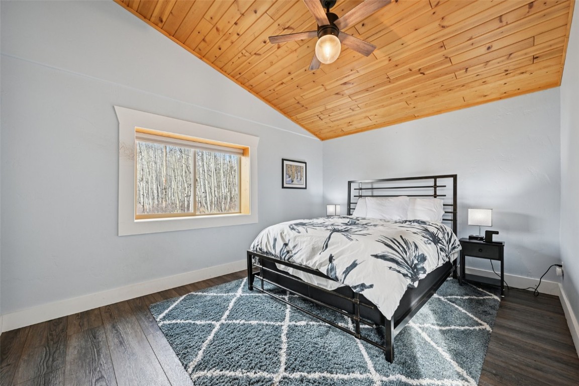 1499 Sheep Ridge Road Fairplay, CO 80440 - Photo 19 of 40 a bedroom with a bed and a window