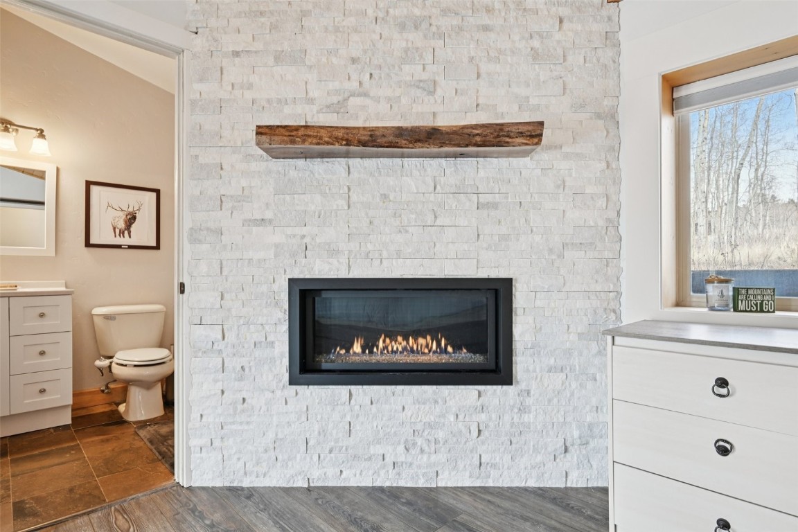 1499 Sheep Ridge Road Fairplay, CO 80440 - Photo 23 of 40 a living room with a fireplace