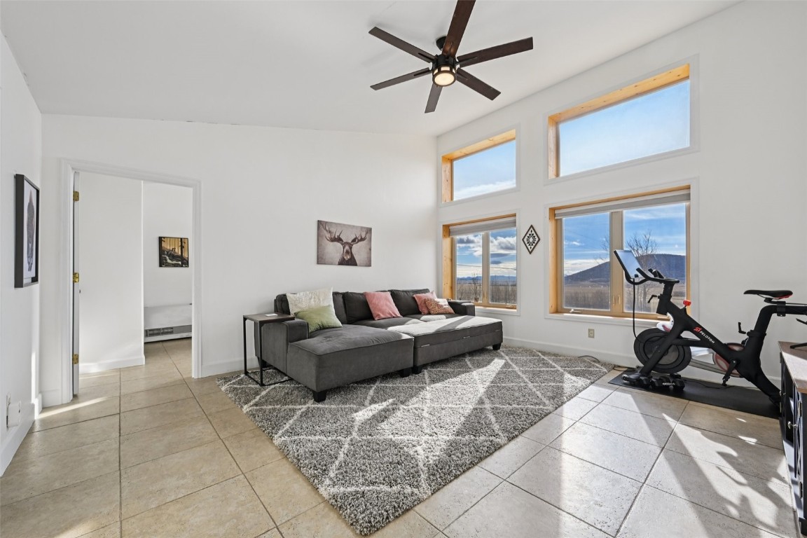 1499 Sheep Ridge Road Fairplay, CO 80440 - Photo 25 of 40 a living room with furniture and a large window
