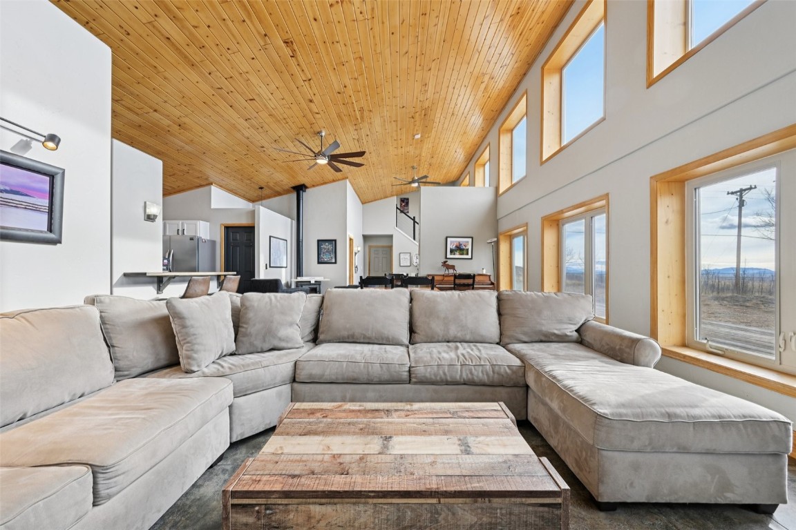 1499 Sheep Ridge Road Fairplay, CO 80440 - Photo 9 of 40 a living room with furniture and a large window