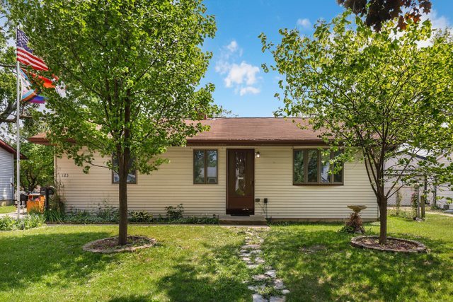 123 Hickory Avenue Streamwood, IL 60107 - Photo 1 of 19 a backyard of a house with lots of green space