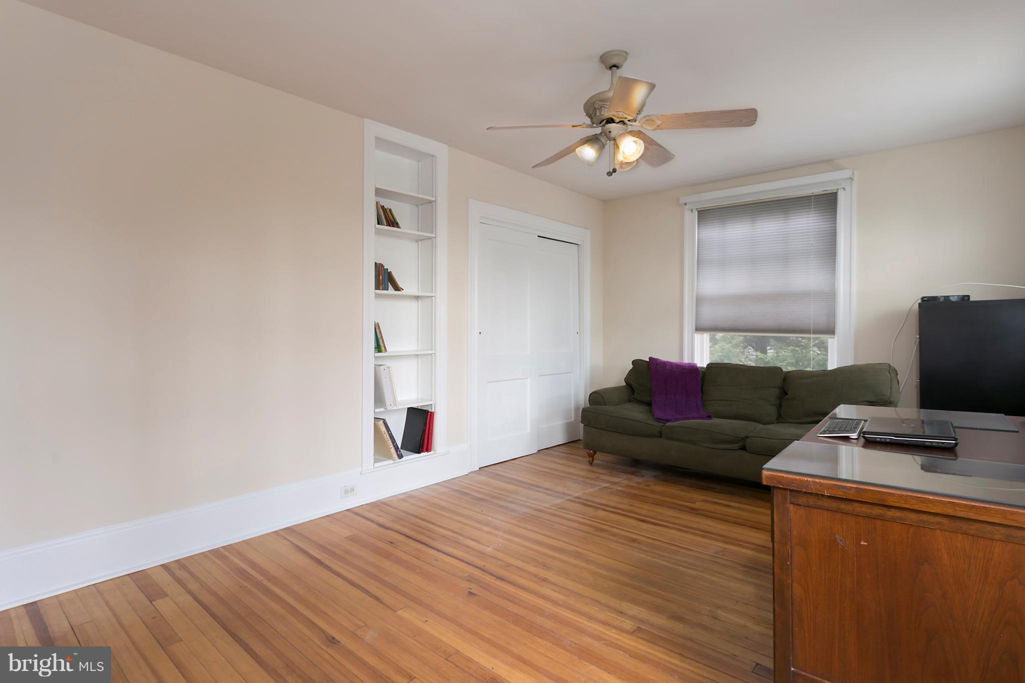 7 North Rolling Road Baltimore, MD 21228 - Photo 22 of 38 a living room with furniture and a wooden floor
