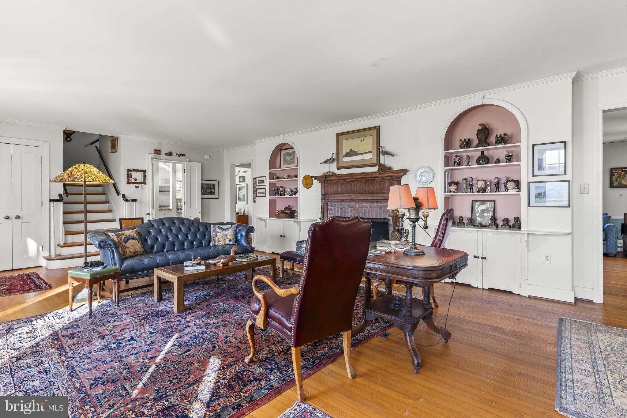 17301 Point Lookout Road Lexington Park, MD 20653 - Photo 24 of 90 Stately living room with built in bookcases