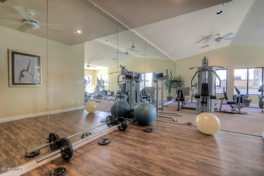 2025 East Campbell Avenue, Unit 341 Phoenix, AZ 85016 - Photo 19 of 20 a view of a room with gym equipment