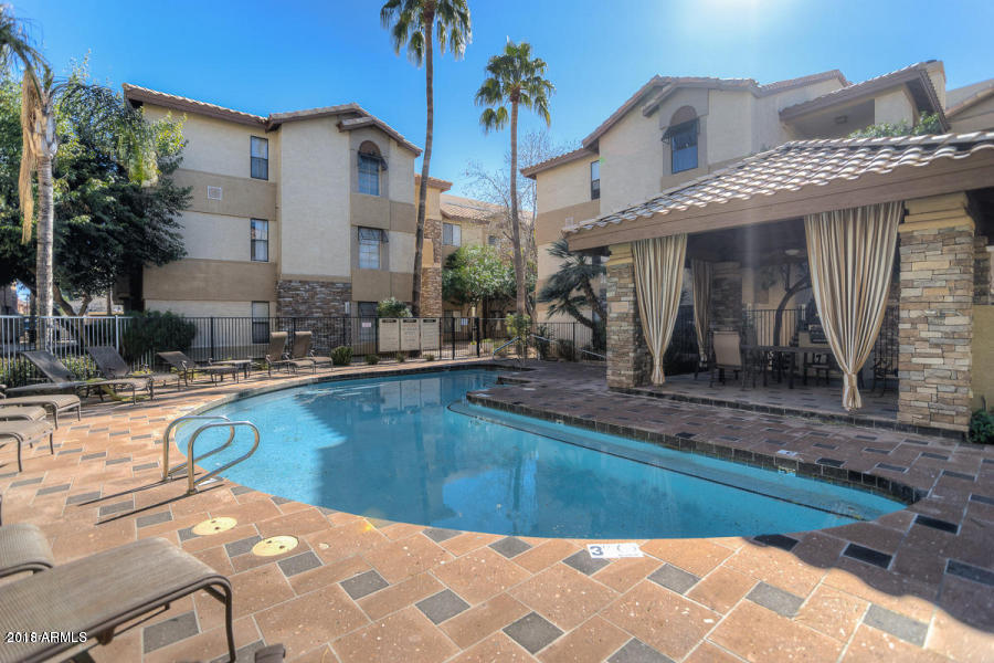 2025 East Campbell Avenue, Unit 341 Phoenix, AZ 85016 - Photo 20 of 20 a view of a house with a swimming pool