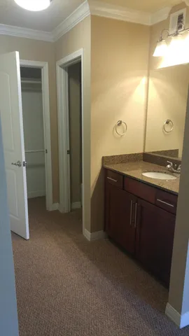 a bathroom with a sink and mirror
