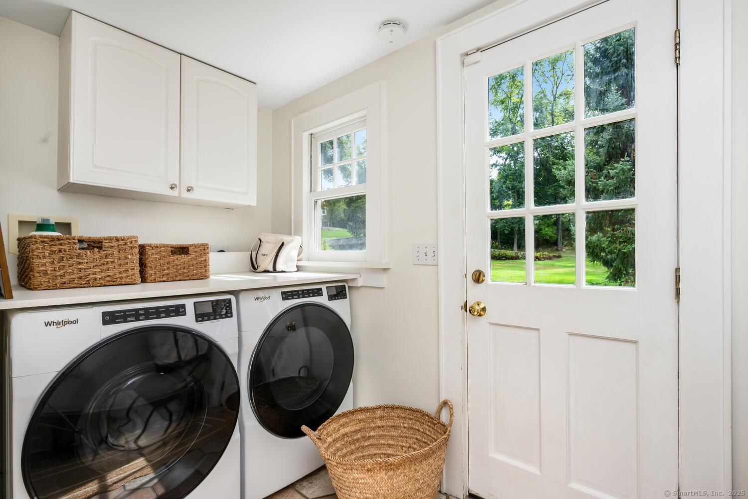128 5 Mile River Road Darien, CT 06820 - Photo 8 of 23 a utility room with sink dryer and washer