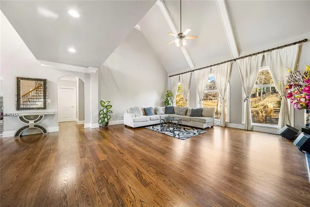 a view of livingroom with dining room and wooden floor