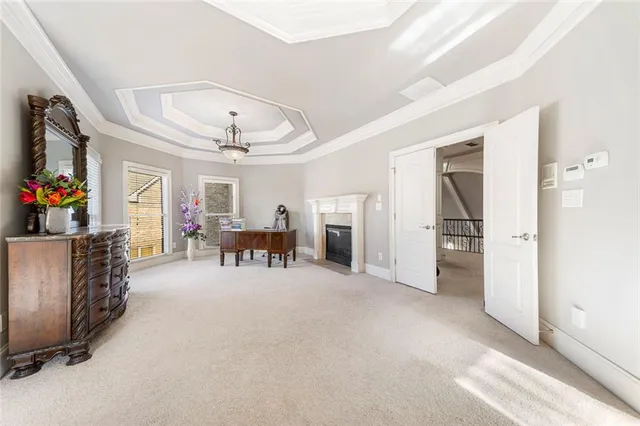a kitchen with kitchen island granite countertop a sink cabinets and window
