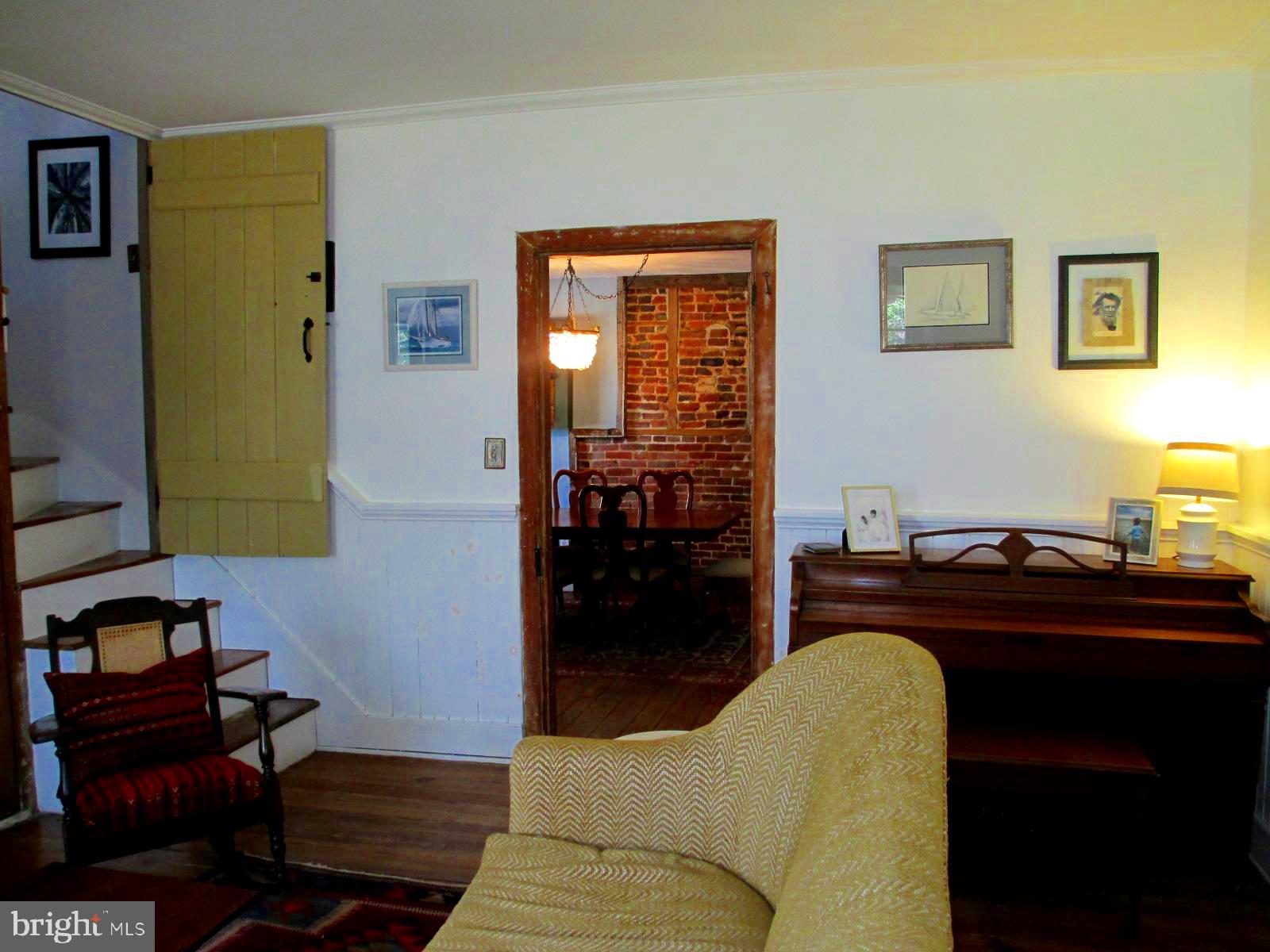 8355 Broad Neck Road Chestertown, MD 21620 - Photo 15 of 33 a living room with furniture and wooden floor