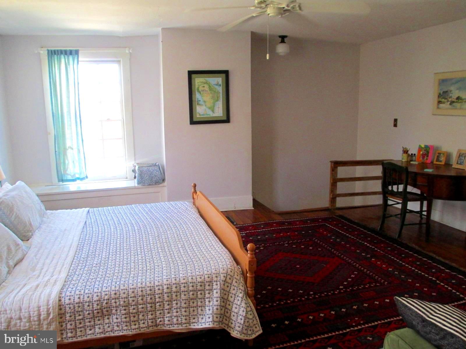 8355 Broad Neck Road Chestertown, MD 21620 - Photo 22 of 33 a bedroom with a bed and a window