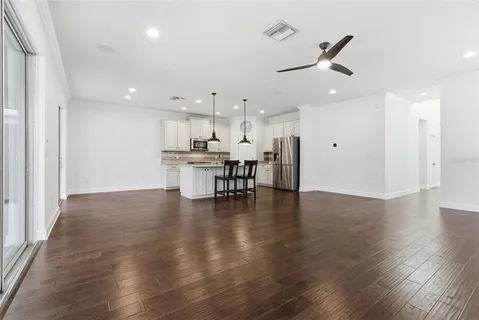 a kitchen with a sink and stove