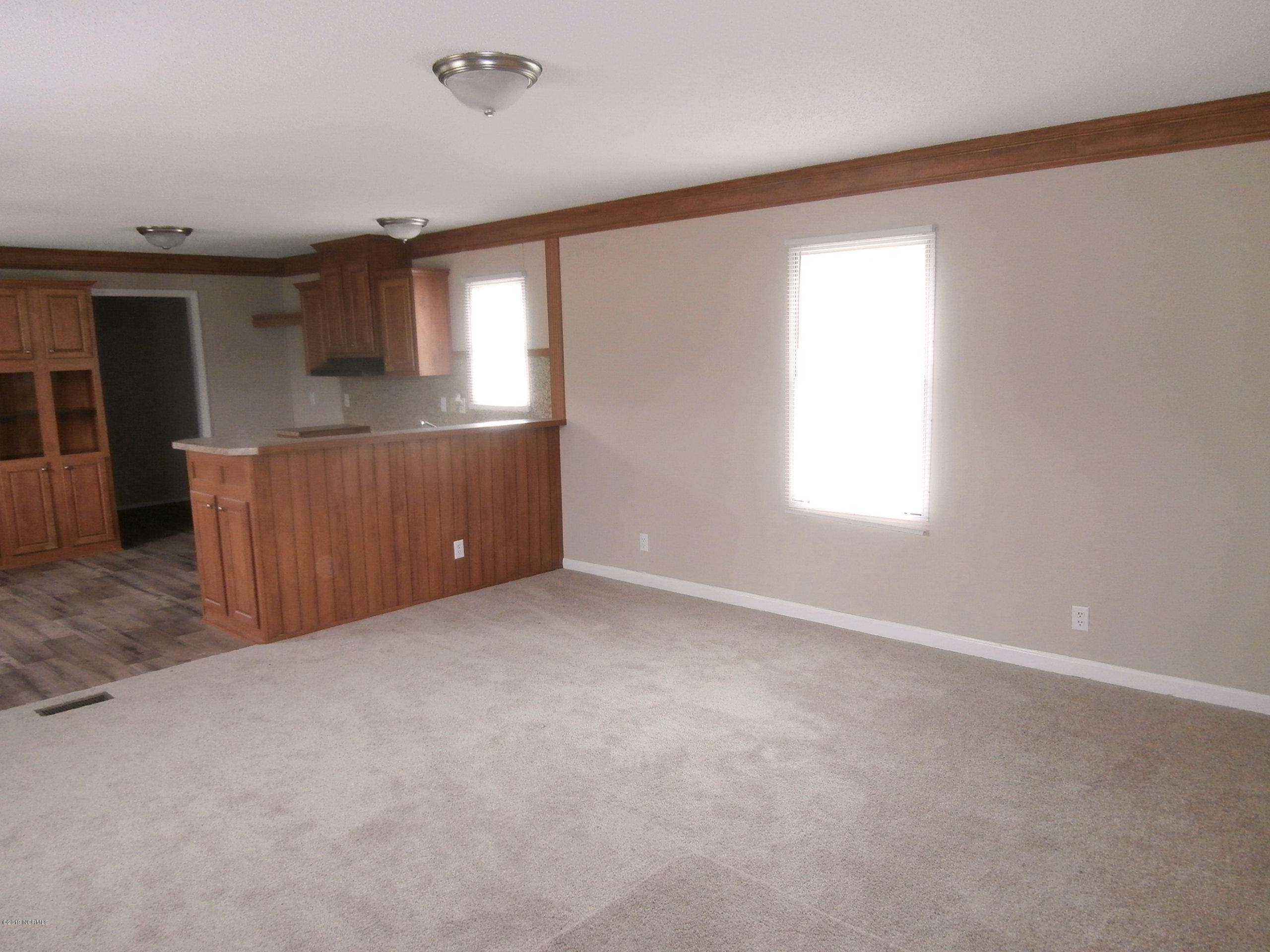 207 Shearin Dead End Road Littleton, NC 27850 - Photo 10 of 21 Living Room view 3 back towards the Kitc