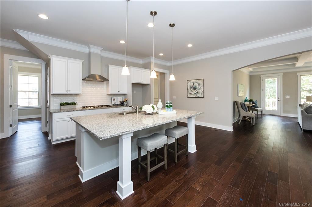 704 Kenway Loop Mooresville, NC 28117 - Photo 13 of 24 a view of kitchen with sink and wooden floor