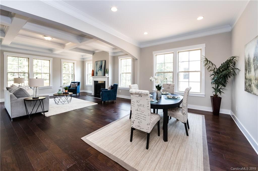 704 Kenway Loop Mooresville, NC 28117 - Photo 18 of 24 a living room with furniture and a table