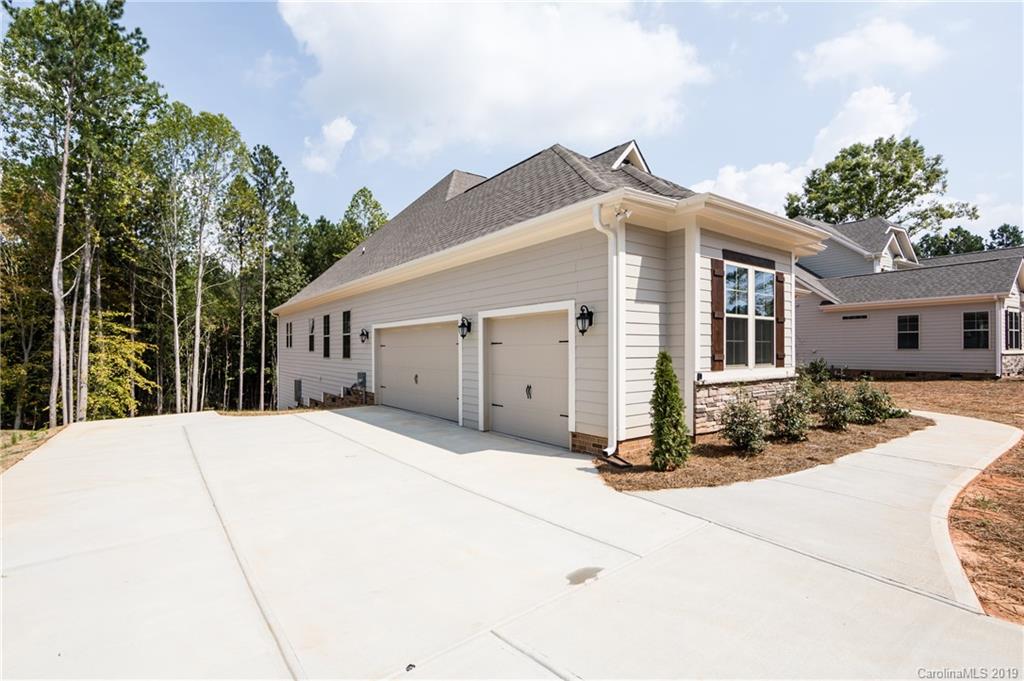 704 Kenway Loop Mooresville, NC 28117 - Photo 3 of 24 a front view of a house with a yard