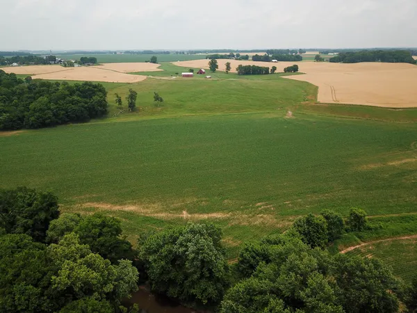 a view of a lake with a big yard