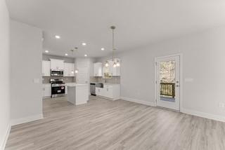 636 Bald Ridge Circle Demorest, GA 30535 - Photo 15 of 35 a view of kitchen with cabinets and wooden floor