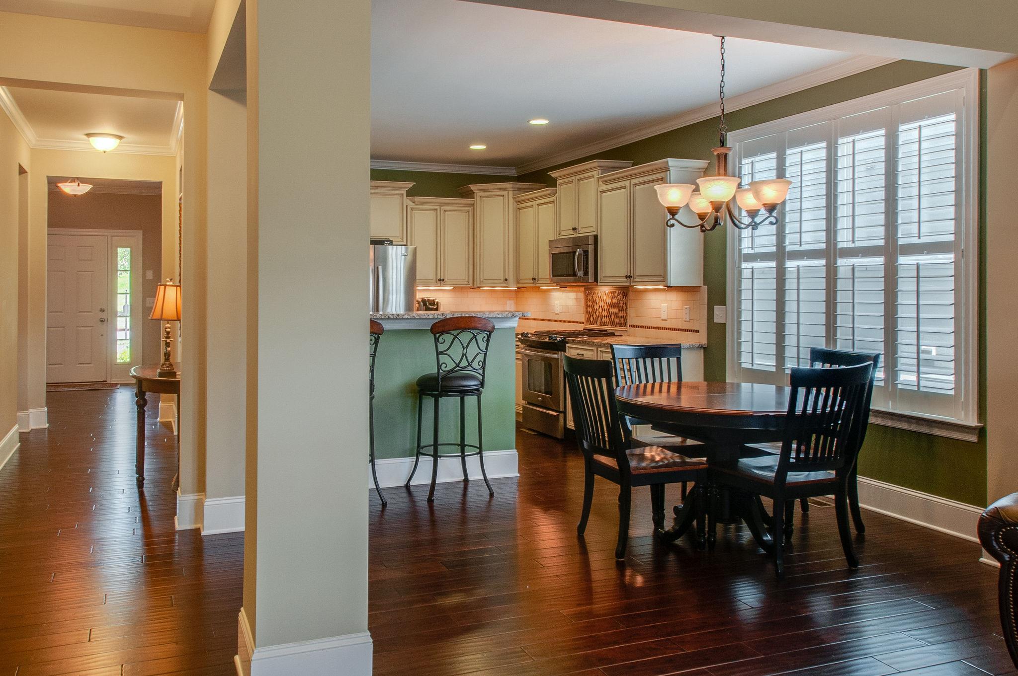 511 Phillips Drive Franklin, TN 37067 - Photo 11 of 29 a dining room with furniture window and wooden floor