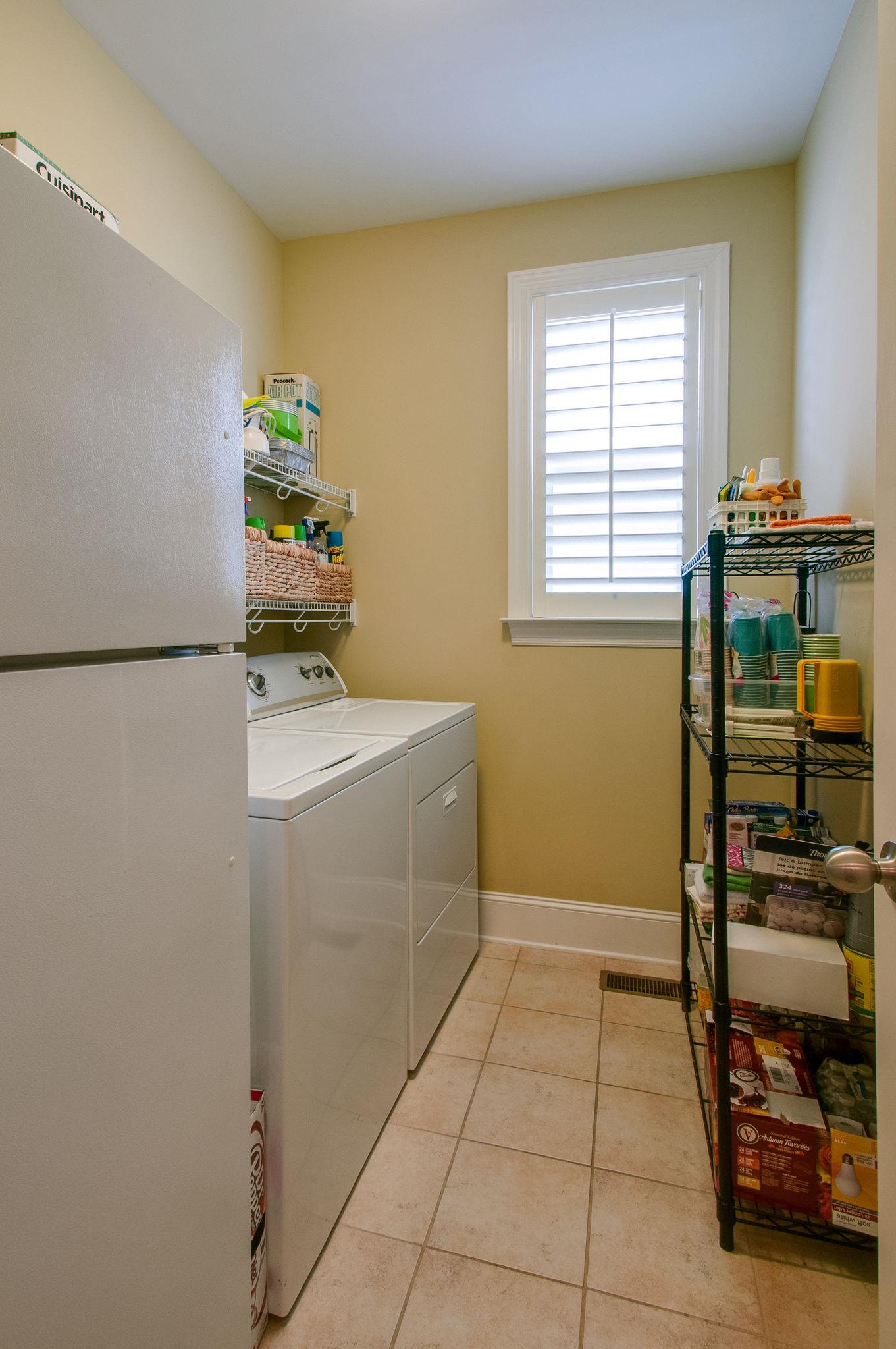 511 Phillips Drive Franklin, TN 37067 - Photo 22 of 29 a room with a sink and cabinets