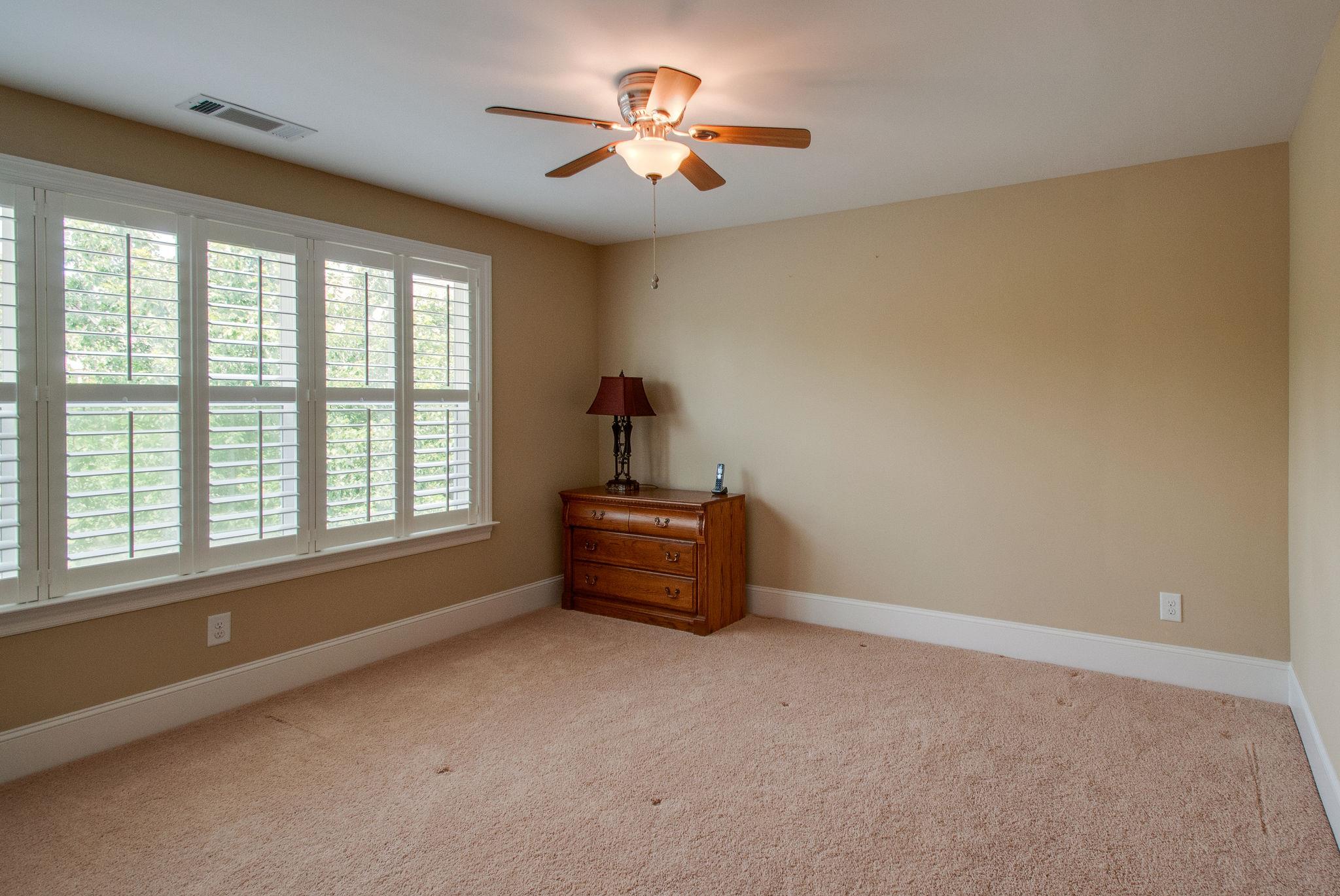 511 Phillips Drive Franklin, TN 37067 - Photo 24 of 29 a room with furniture and a window