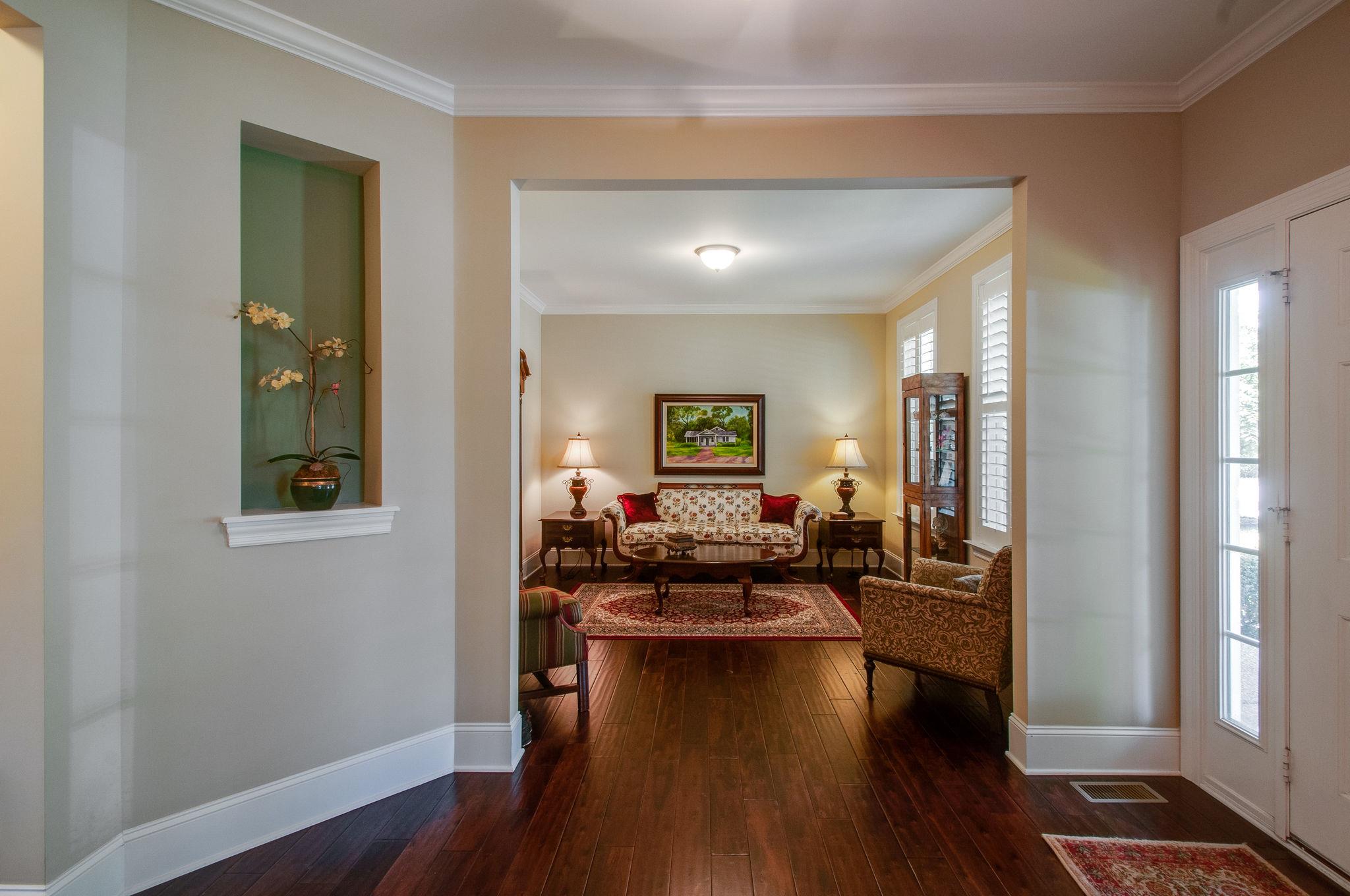 511 Phillips Drive Franklin, TN 37067 - Photo 5 of 29 a living room with furniture and wooden floor