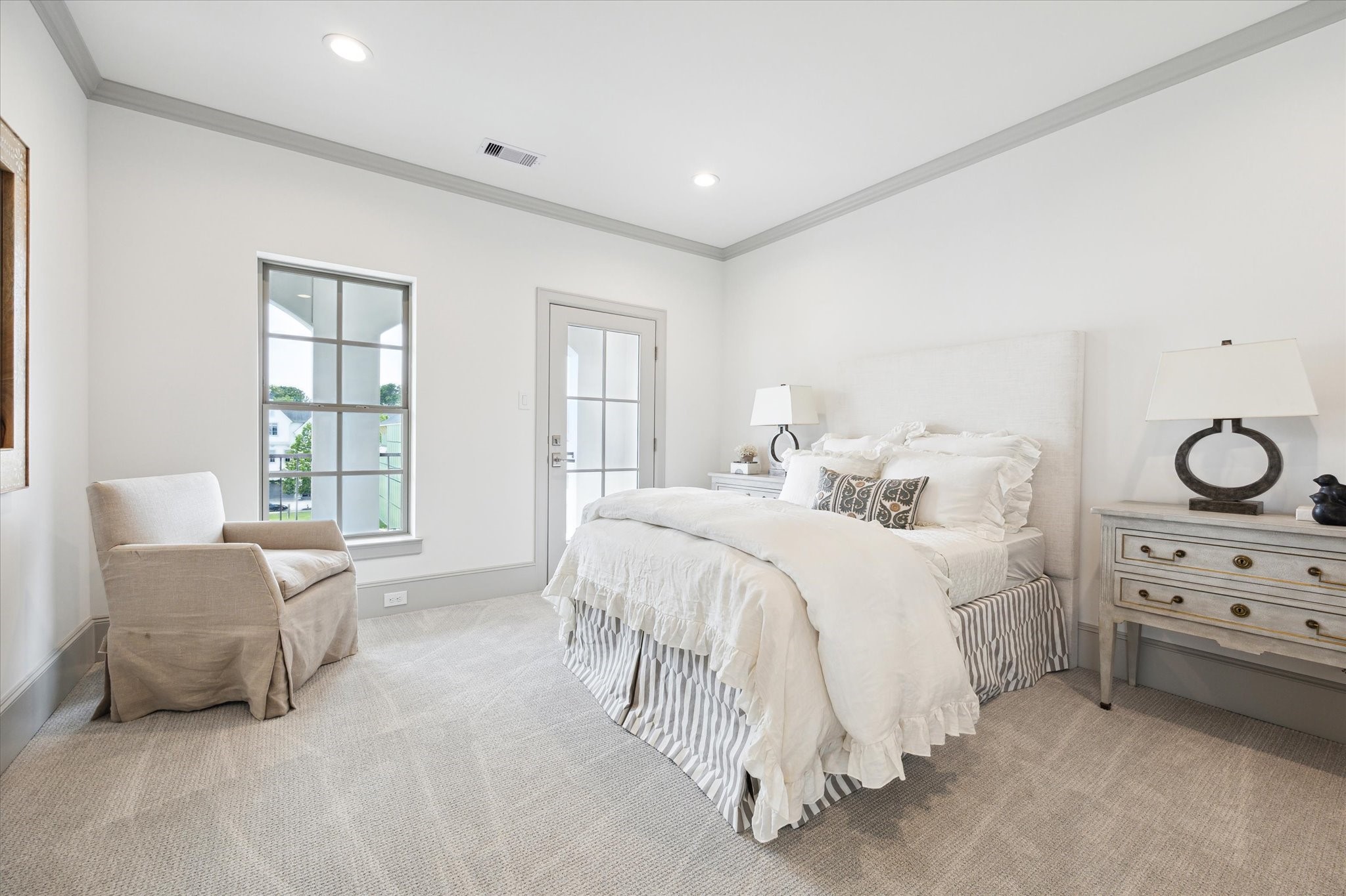 207 Sutton Row Place Houston, TX 77024 - Photo 22 of 29 Third-floor Secondary Bedroom with walk-in closet, and glass door for access to balcony.