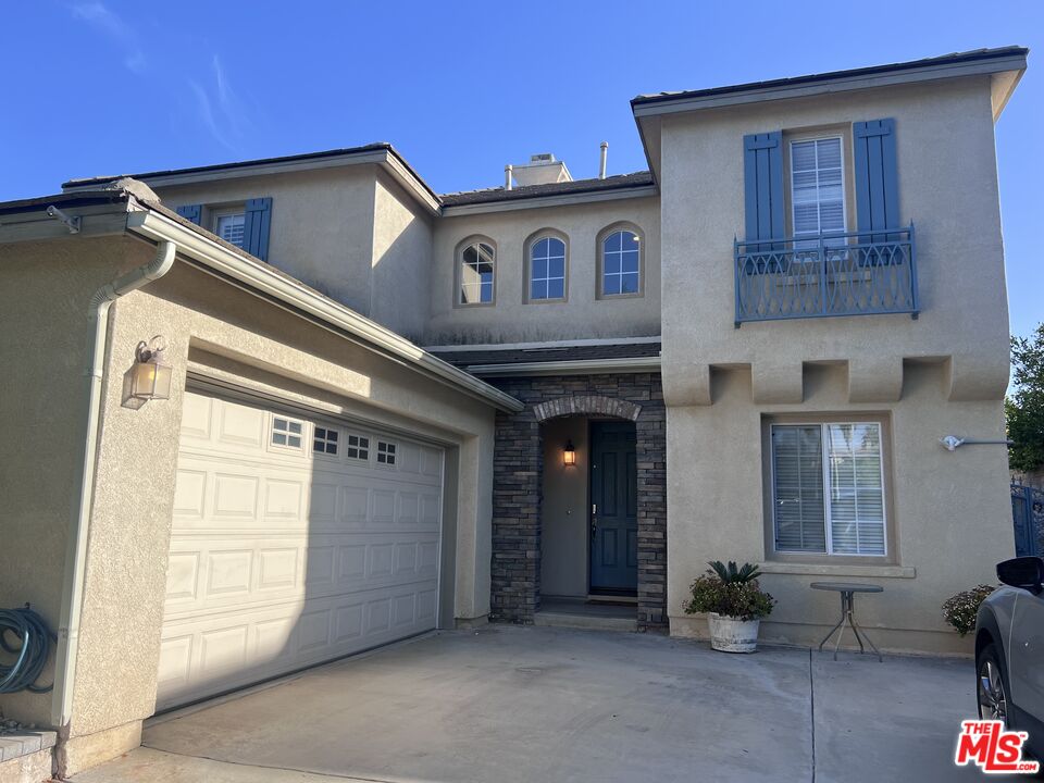 26526 Beecher Lane Stevenson Ranch, CA 91381 - Photo 2 of 31 a view of a house with a outdoor space