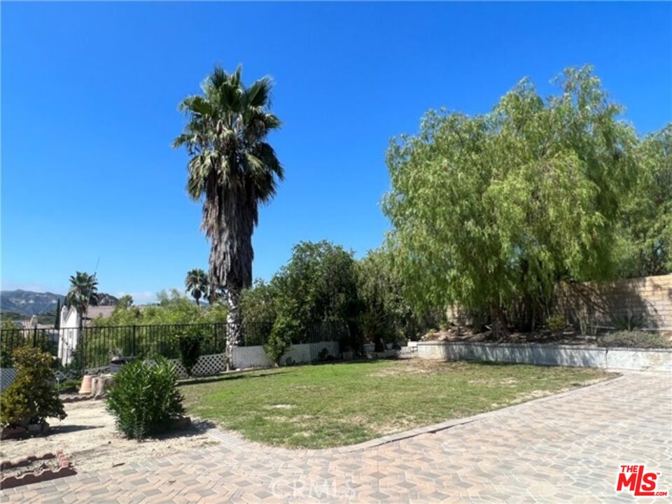 26526 Beecher Lane Stevenson Ranch, CA 91381 - Photo 30 of 31 a view of a garden
