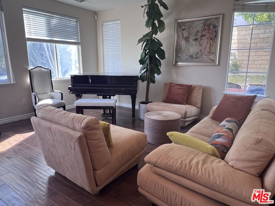 26526 Beecher Lane Stevenson Ranch, CA 91381 - Photo 6 of 31 a living room with furniture and a window