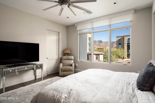a bathroom with a tub sink and a mirror