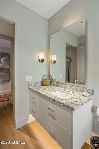 a shelf with books and knick knacks on it