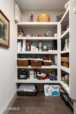 a view of parking garage with cars