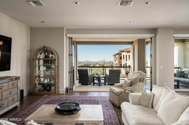 a room with furniture and a window