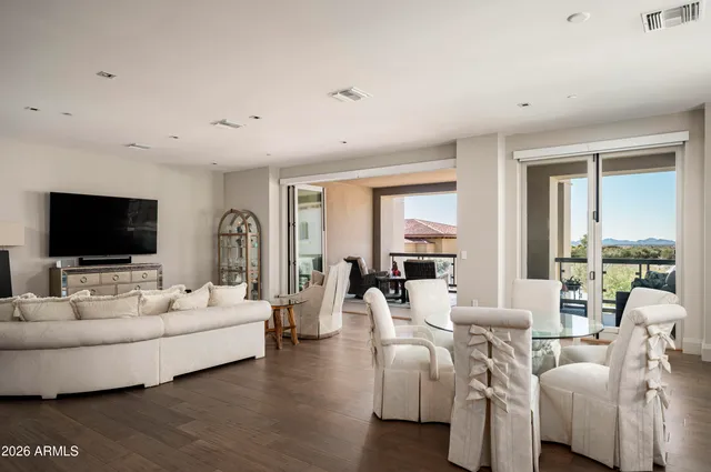 a view of a dining room with furniture window and outside view