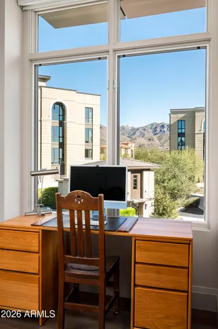 a room with furniture and a window