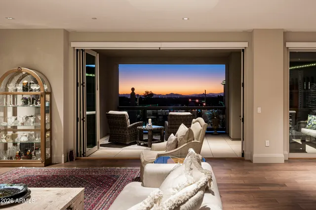 a view of a living room and kitchen