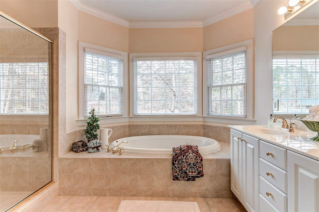 2401 Carruthers Court Raleigh, NC 27615 - Photo 16 of 25 Owner's Bathroom