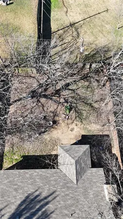 a view of a backyard of the house