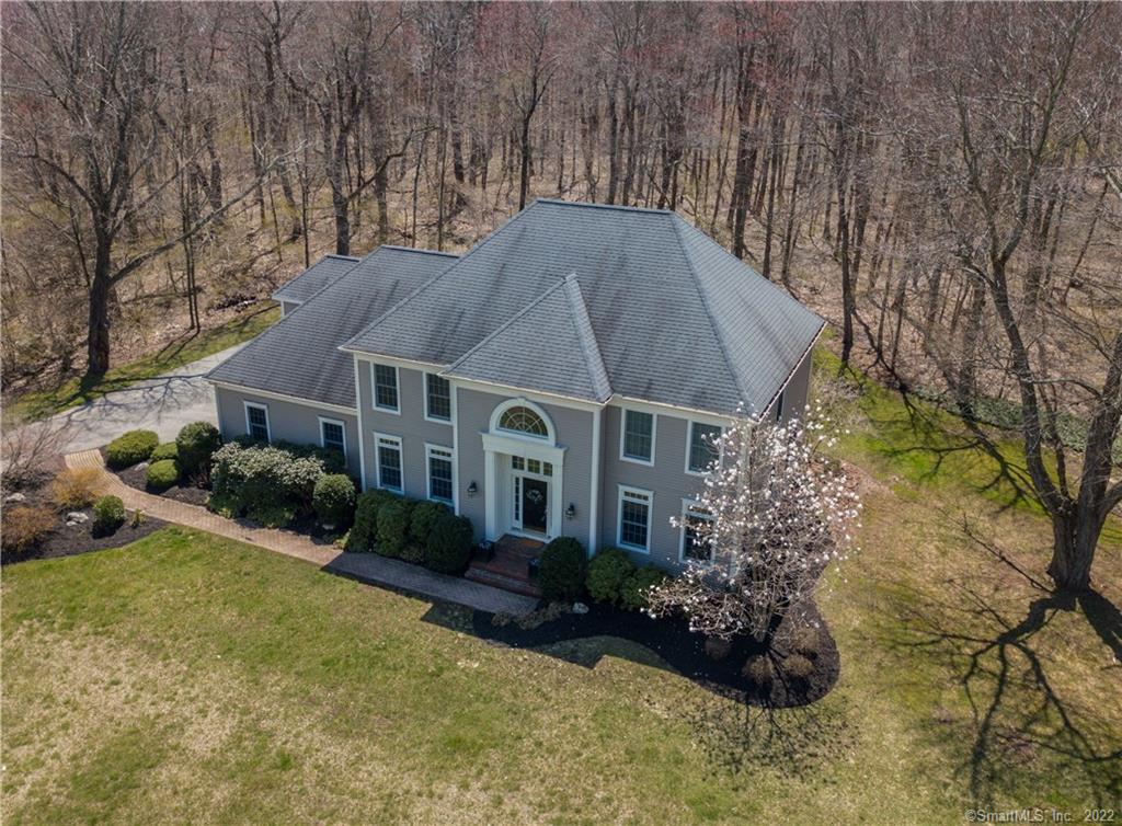 44 Fox Ridge Lane Hebron, CT 06248 - Photo 1 of 1 a aerial view of a house with a yard and plants